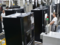 Workers are assembling refrigerators at the LG Refrigerator production base in Taizhou, China, on May 23, 2024. This is LG's largest refrige...