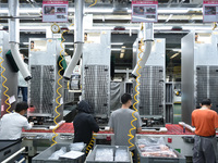 Workers are assembling refrigerators at the LG Refrigerator production base in Taizhou, China, on May 23, 2024. This is LG's largest refrige...