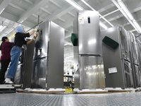 Workers are assembling refrigerators at the LG Refrigerator production base in Taizhou, China, on May 23, 2024. This is LG's largest refrige...