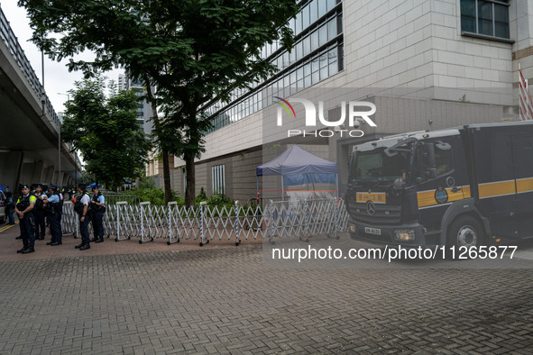 The prison van is believed to be carrying Jimmy Lai and is leaving the courthouse where the trial of Jimmy Lai, the founder of the now-shutt...