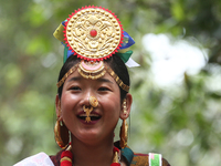 A Nepalese girl from the Kirat community is wearing traditional attire during the Ubhauli festival in Lalitpur, Nepal, on May 23, 2024. (