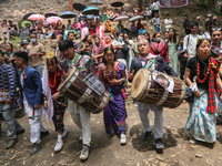 Nepalese people from the Kirat community are wearing traditional attire and playing and dancing during the Ubhauli festival in Lalitpur, Nep...