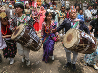 Nepalese people from the Kirat community are wearing traditional attire and playing and dancing during the Ubhauli festival in Lalitpur, Nep...