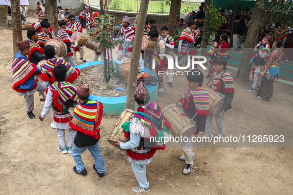 Nepalese people from the Kirat community are wearing traditional attire and playing and dancing during the Ubhauli festival in Lalitpur, Nep...