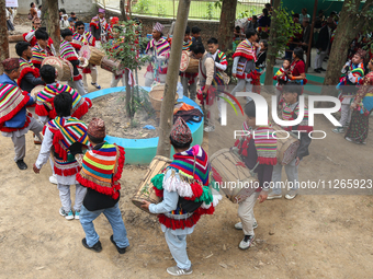 Nepalese people from the Kirat community are wearing traditional attire and playing and dancing during the Ubhauli festival in Lalitpur, Nep...