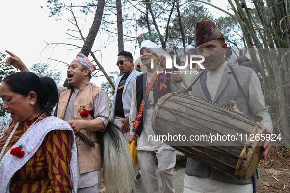 Nepalese people from the Kirat community are wearing traditional attire and playing and dancing during the Ubhauli festival in Lalitpur, Nep...