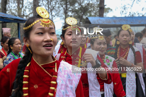 Nepalese people from the Kirat community are wearing traditional attire and playing and dancing during the Ubhauli festival in Lalitpur, Nep...