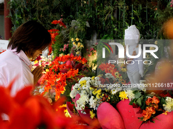 A Buddhist is praying to coincide with Vesak Day 2024 at Maha Vihara Maitreya in Medan Estate, Deli Serdang Regency, North Sumatra, Indonesi...