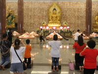 Buddhists are worshipping Buddha statues to carry out worship and prayers to coincide with Vesak Day 2024 at Maha Vihara Maitreya, Medan Est...