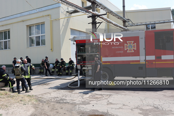 Rescuers are responding to a Russian S-300 missile strike on a printing company in Kharkiv, Ukraine, on May 23, 2024. As reported, on the mo...