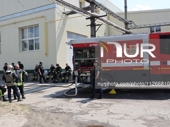 Rescuers are responding to a Russian S-300 missile strike on a printing company in Kharkiv, Ukraine, on May 23, 2024. As reported, on the mo...