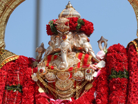 Tamil Hindu devotees are taking part in the chariot procession (ther) during the Ganesha Mahotshava Vingnapanam Festival at the Ganesh Templ...