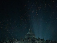 Thousands of lanterns are illuminating the night sky above Borobudur Temple, creating a breathtaking view. Each lantern is symbolizing hope...