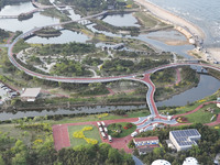 Tourists and citizens are enjoying themselves on the Sunshine Coast Greenway in Rizhao, China, on May 23, 2024. (