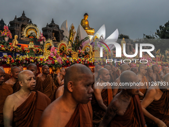 Buddhist monks are offering prayers at the celebration of Vesak Day 2568 B.E. at Borobudur Temple in Magelang, Central Java, on May 23, 2024...