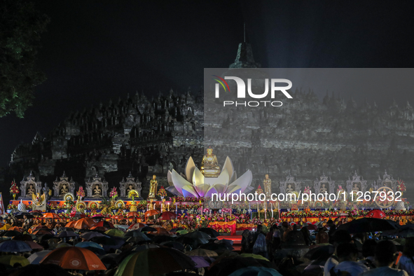 Buddhists are offering prayers during the celebration of Vesak Day 2568 B.E. at Borobudur Temple in Magelang, Central Java, on May 23, 2024 