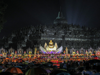 Buddhists are offering prayers during the celebration of Vesak Day 2568 B.E. at Borobudur Temple in Magelang, Central Java, on May 23, 2024...