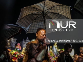 Buddhist monks are offering prayers at the celebration of Vesak Day 2568 B.E. at Borobudur Temple in Magelang, Central Java, on May 23, 2024...