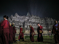 Buddhist monks are offering prayers at the celebration of Vesak Day 2568 B.E. at Borobudur Temple in Magelang, Central Java, on May 23, 2024...