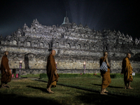 Buddhist monks are offering prayers at the celebration of Vesak Day 2568 B.E. at Borobudur Temple in Magelang, Central Java, on May 23, 2024...