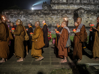 Buddhist monks are offering prayers at the celebration of Vesak Day 2568 B.E. at Borobudur Temple in Magelang, Central Java, on May 23, 2024...