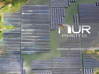 Solar photovoltaic panels are lining up at a photovoltaic power plant in Liuzhou, China, on May 16, 2024. (