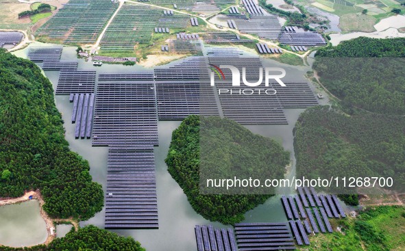 Solar photovoltaic panels are lining up at a photovoltaic power plant in Liuzhou, China, on May 16, 2024. 