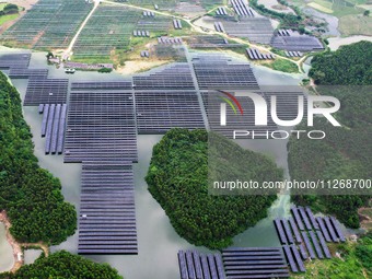 Solar photovoltaic panels are lining up at a photovoltaic power plant in Liuzhou, China, on May 16, 2024. (