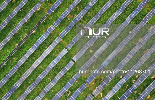 Solar photovoltaic panels are lining up at a photovoltaic power plant in Liuzhou, China, on May 16, 2024. 