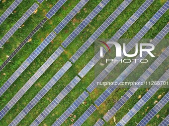 Solar photovoltaic panels are lining up at a photovoltaic power plant in Liuzhou, China, on May 16, 2024. (