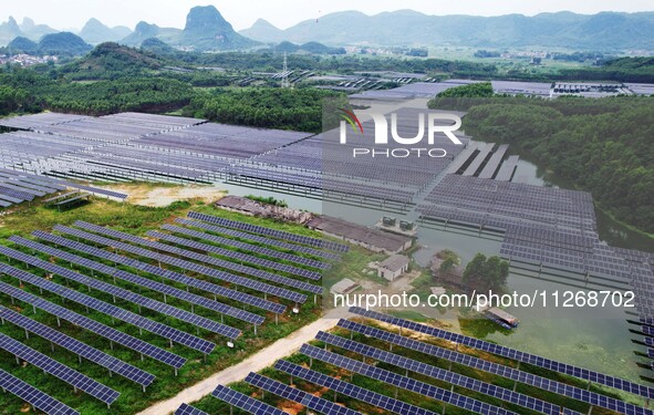 Solar photovoltaic panels are lining up at a photovoltaic power plant in Liuzhou, China, on May 16, 2024. 