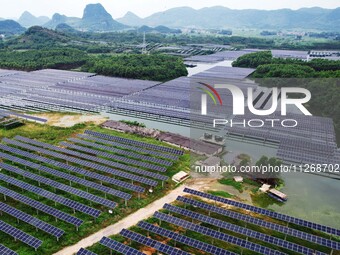 Solar photovoltaic panels are lining up at a photovoltaic power plant in Liuzhou, China, on May 16, 2024. (