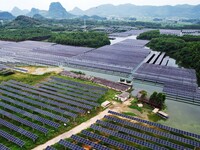 Solar photovoltaic panels are lining up at a photovoltaic power plant in Liuzhou, China, on May 16, 2024. (