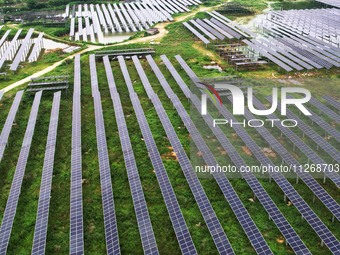 Solar photovoltaic panels are lining up at a photovoltaic power plant in Liuzhou, China, on May 16, 2024. (