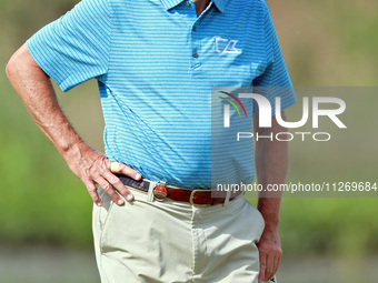 Scott Dunlap of Sarasota, Florida waits on the 6th green during the second round of the KitchenAid Senior PGA Championship at Harbor Shores...