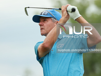 Scott Dunlap tees off on the 17th hole during the second round of the KitchenAid Senior PGA Championship at Harbor Shores Resort in Benton H...
