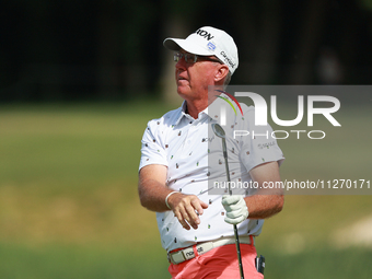 Alan Morin of USA follows his fairway shot on the 16 hole during the second round of the KitchenAid Senior PGA Championship at Harbor Shores...