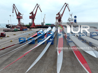 Wind power equipment is being prepared for export at the terminal in Lianyungang, Jiangsu province, in Lianyungang, China, on May 25, 2024....