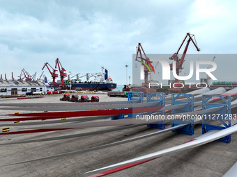 Wind power equipment is being prepared for export at the terminal in Lianyungang, Jiangsu province, in Lianyungang, China, on May 25, 2024....