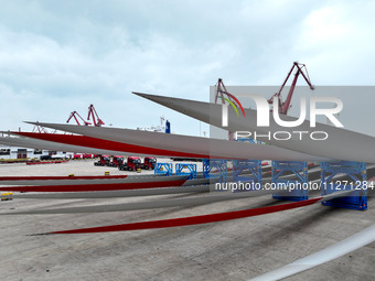 Wind power equipment is being prepared for export at the terminal in Lianyungang, Jiangsu province, in Lianyungang, China, on May 25, 2024....