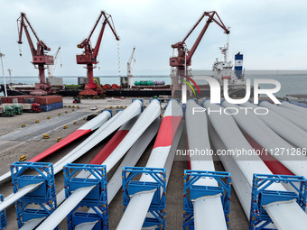 Wind power equipment is being prepared for export at the terminal in Lianyungang, Jiangsu province, in Lianyungang, China, on May 25, 2024....