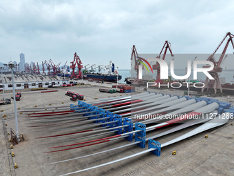 Wind power equipment is being prepared for export at the terminal in Lianyungang, Jiangsu province, in Lianyungang, China, on May 25, 2024....