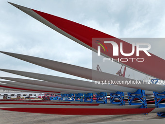 Wind power equipment is being prepared for export at the terminal in Lianyungang, Jiangsu province, in Lianyungang, China, on May 25, 2024....