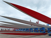 Wind power equipment is being prepared for export at the terminal in Lianyungang, Jiangsu province, in Lianyungang, China, on May 25, 2024....