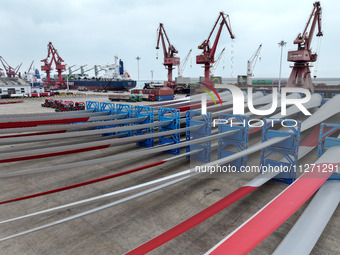 Wind power equipment is being prepared for export at the terminal in Lianyungang, Jiangsu province, in Lianyungang, China, on May 25, 2024....