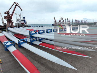 Wind power equipment is being prepared for export at the terminal in Lianyungang, Jiangsu province, in Lianyungang, China, on May 25, 2024....