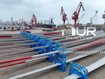 Wind power equipment is being prepared for export at the terminal in Lianyungang, Jiangsu province, in Lianyungang, China, on May 25, 2024....