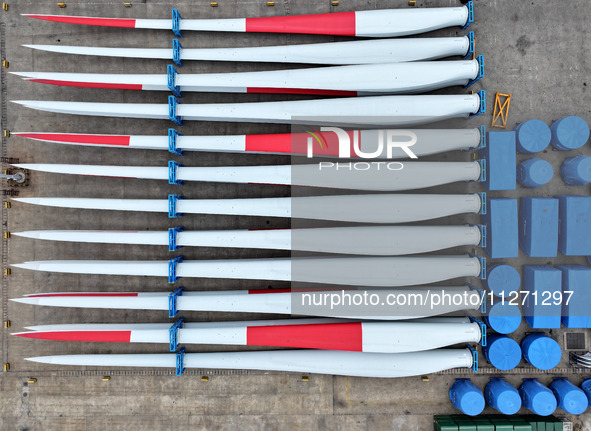 Wind power equipment is being prepared for export at the terminal in Lianyungang, Jiangsu province, in Lianyungang, China, on May 25, 2024. 