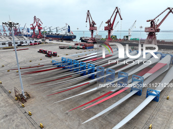 Wind power equipment is being prepared for export at the terminal in Lianyungang, Jiangsu province, in Lianyungang, China, on May 25, 2024....