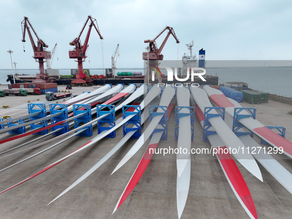 Wind power equipment is being prepared for export at the terminal in Lianyungang, Jiangsu province, in Lianyungang, China, on May 25, 2024. 